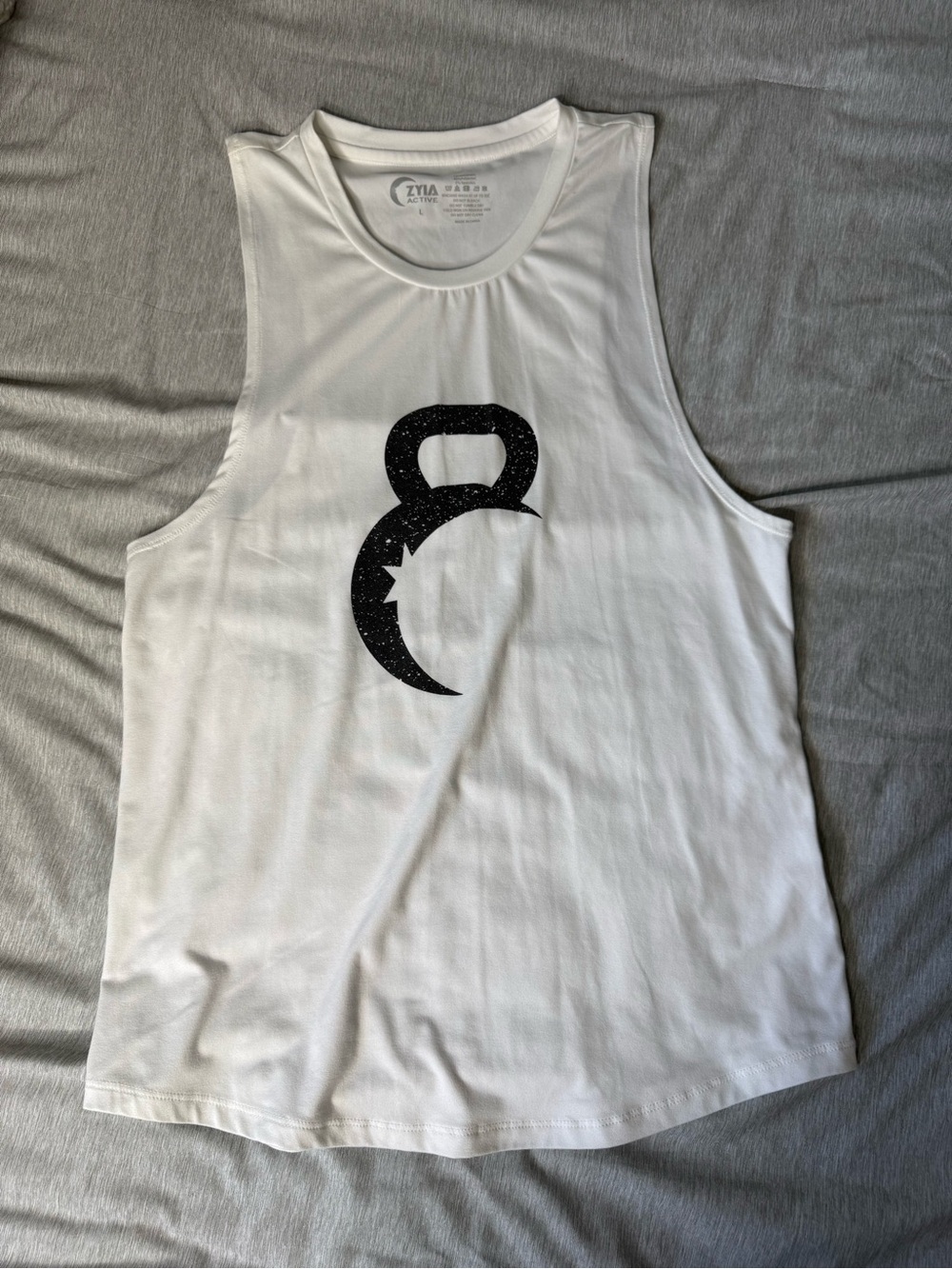 Zyia Womens White Sleeveless Workout Tank with Black Kettlebell Graphic